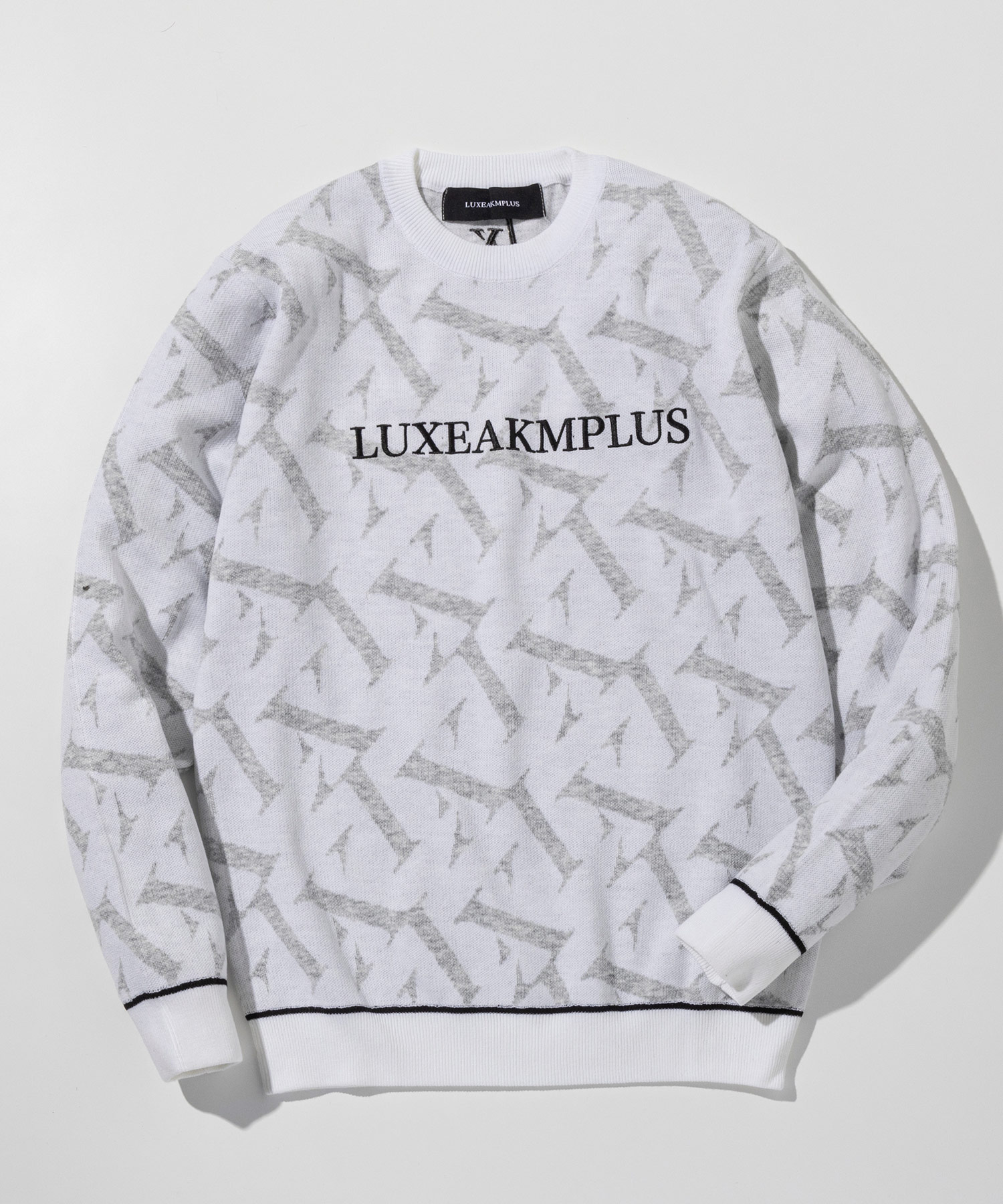 LUXEAKMPLUS(リュクスエイケイエムプラス)ゴルフ 総柄長袖ニット